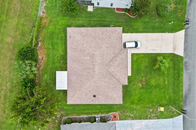 a view of a garden with an ocean