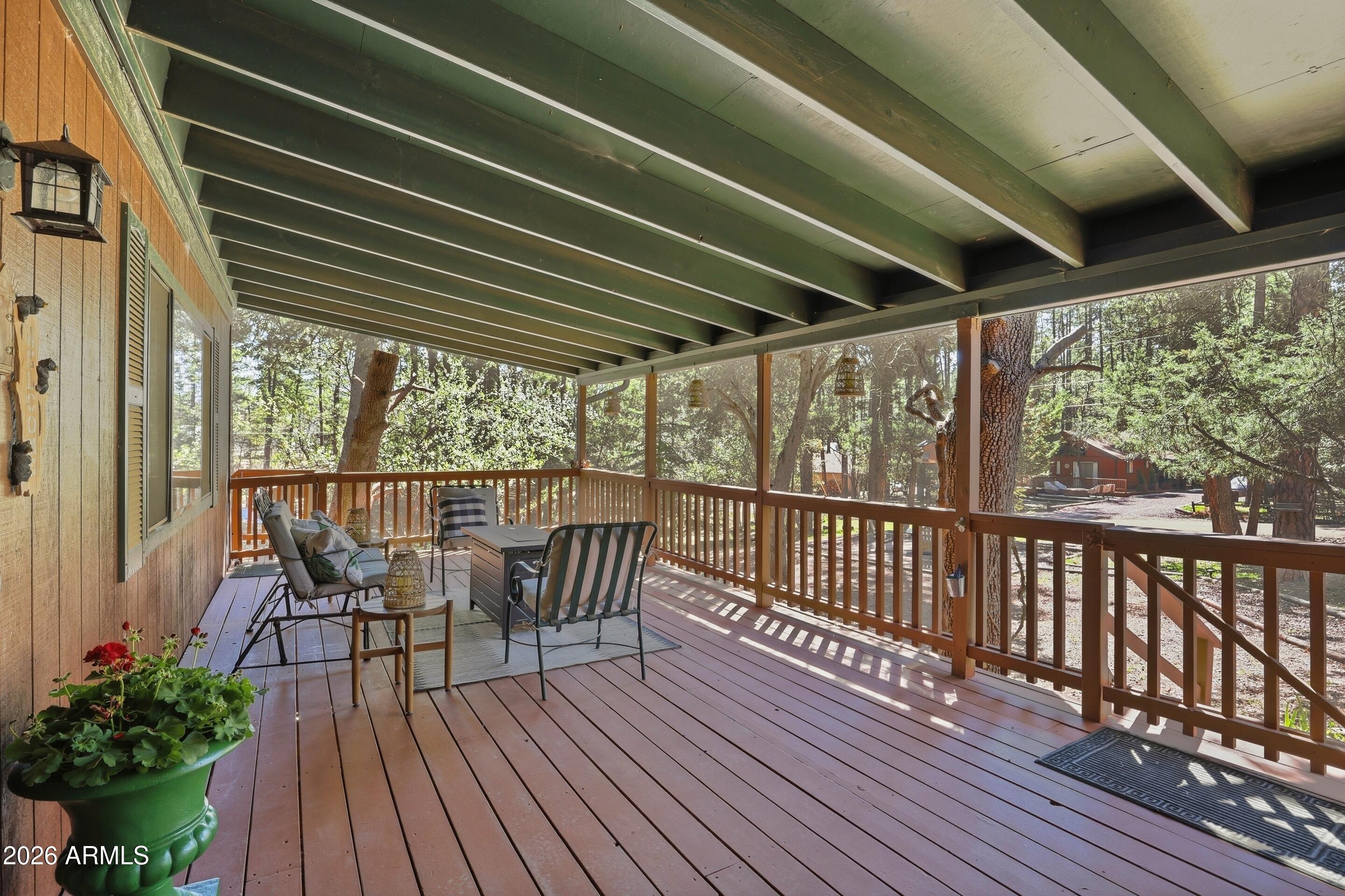 6740 Ridge Road Pine, AZ 85544 - Photo 4 of 35 a view of a chairs and table on the wooden floor