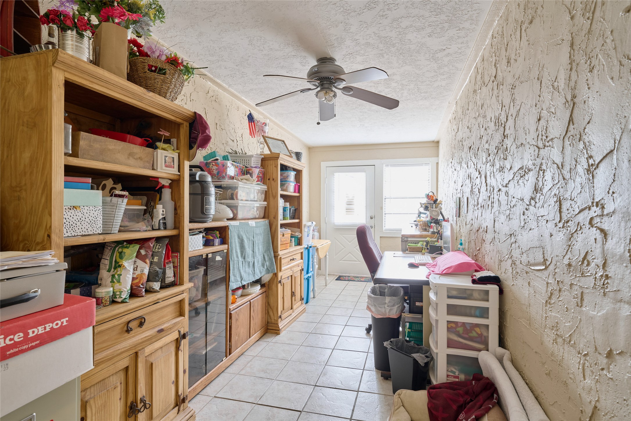 39 Regency Point Montgomery, TX 77356 - Photo 15 of 43 a dining room with furniture and a book shelf