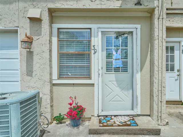 a front view of a house with an outdoor space