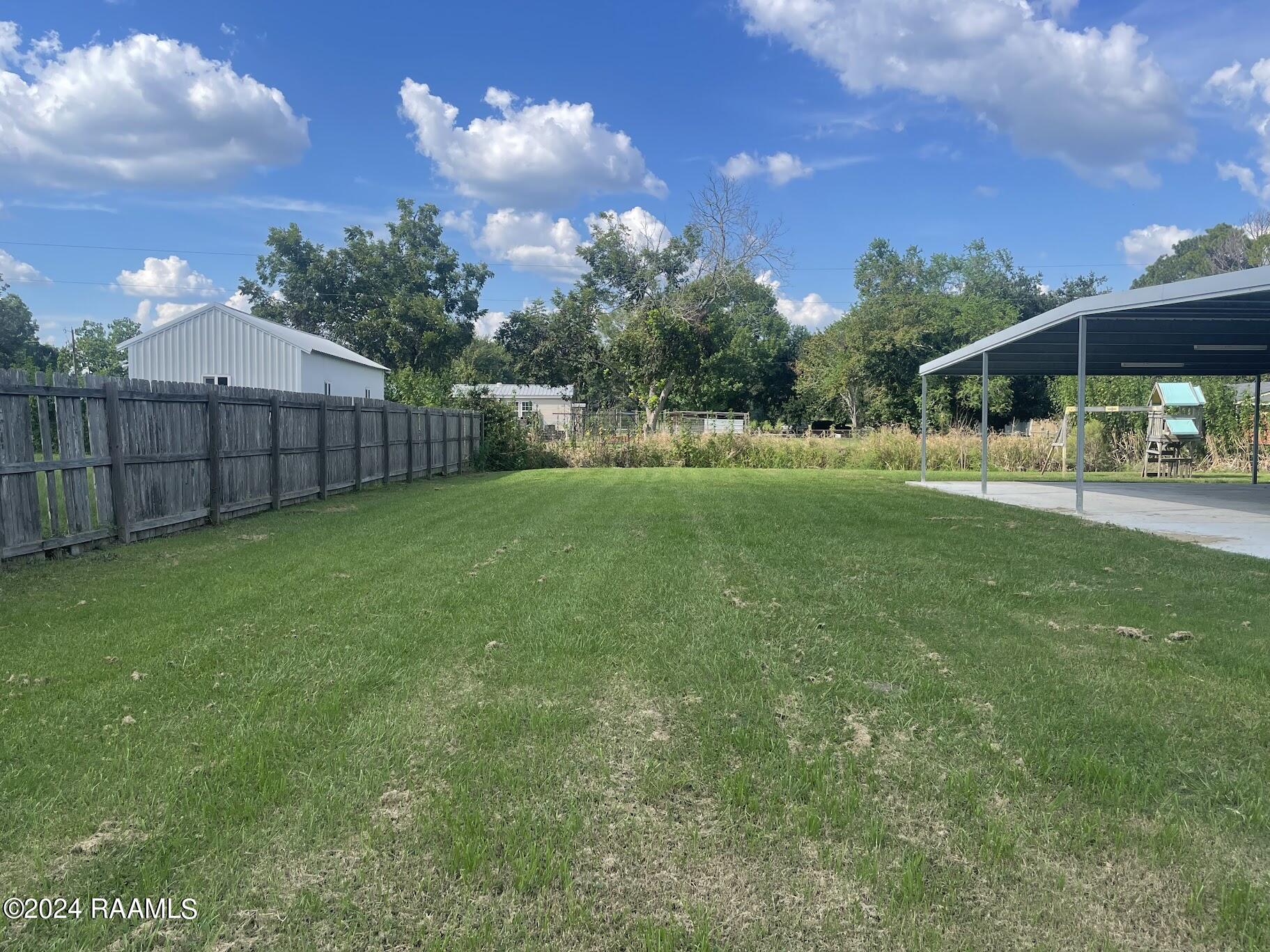135 Cajun Creek Road Rayne, LA 70578 - Photo 20 of 24 cajun left yard