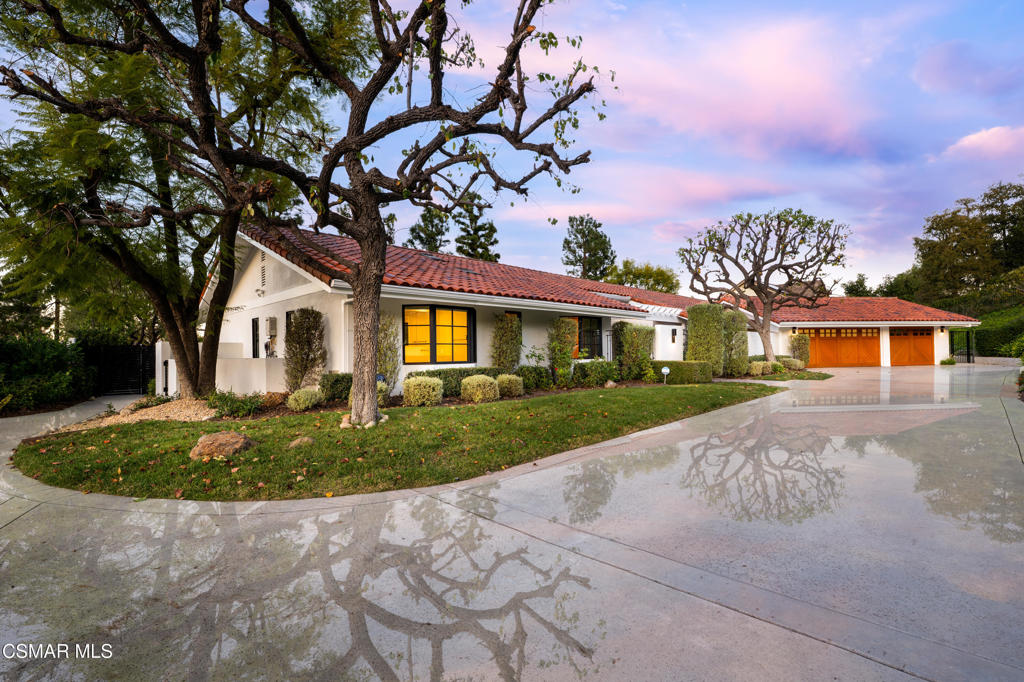 87 Pinecrest Road Westlake Village, CA 91361 - Photo 2 of 76 a front view of a house with garden