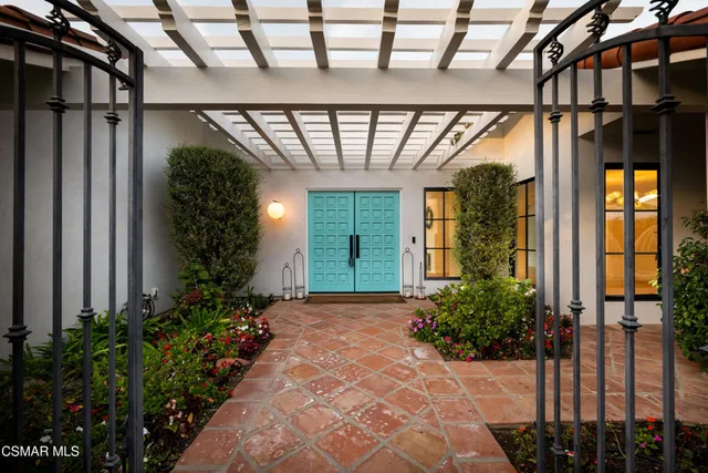 a view of a living room and floor to ceiling window