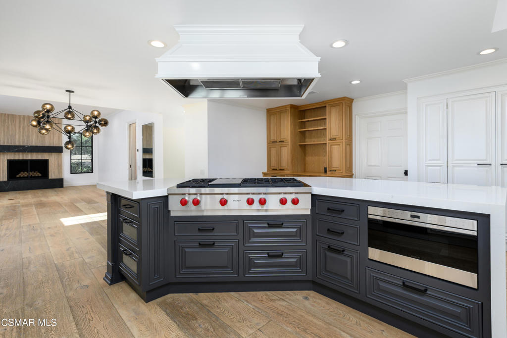 87 Pinecrest Road Westlake Village, CA 91361 - Photo 41 of 76 a kitchen with a stove and a refrigerator