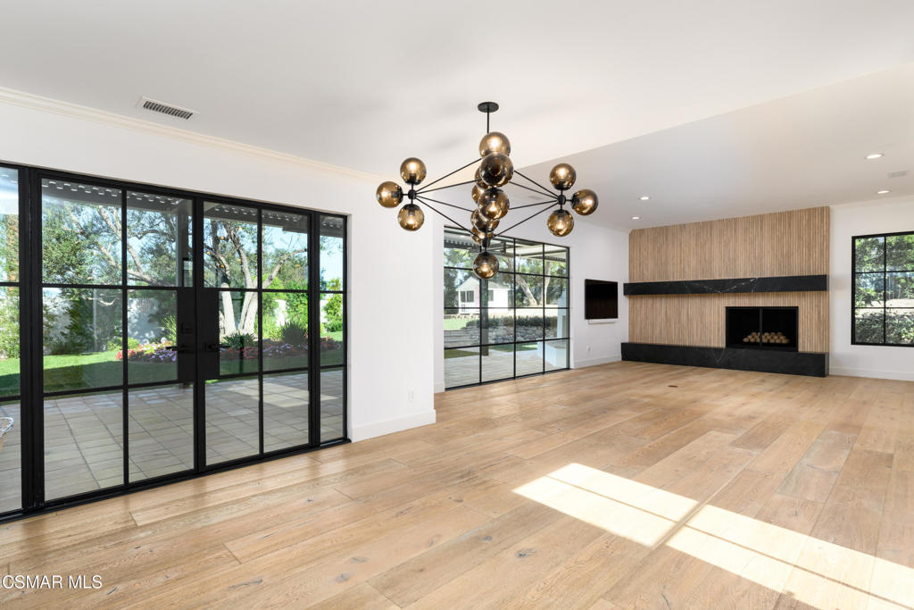 87 Pinecrest Road Westlake Village, CA 91361 - Photo 43 of 76 a view of a livingroom with a fireplace and window