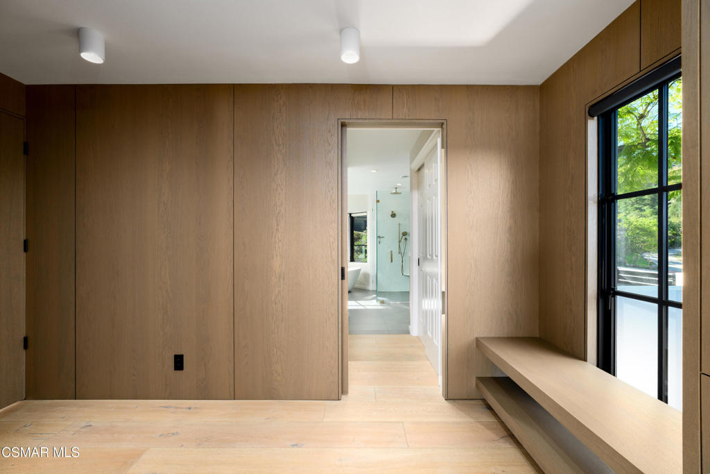 87 Pinecrest Road Westlake Village, CA 91361 - Photo 52 of 76 a view of a hallway with bathroom