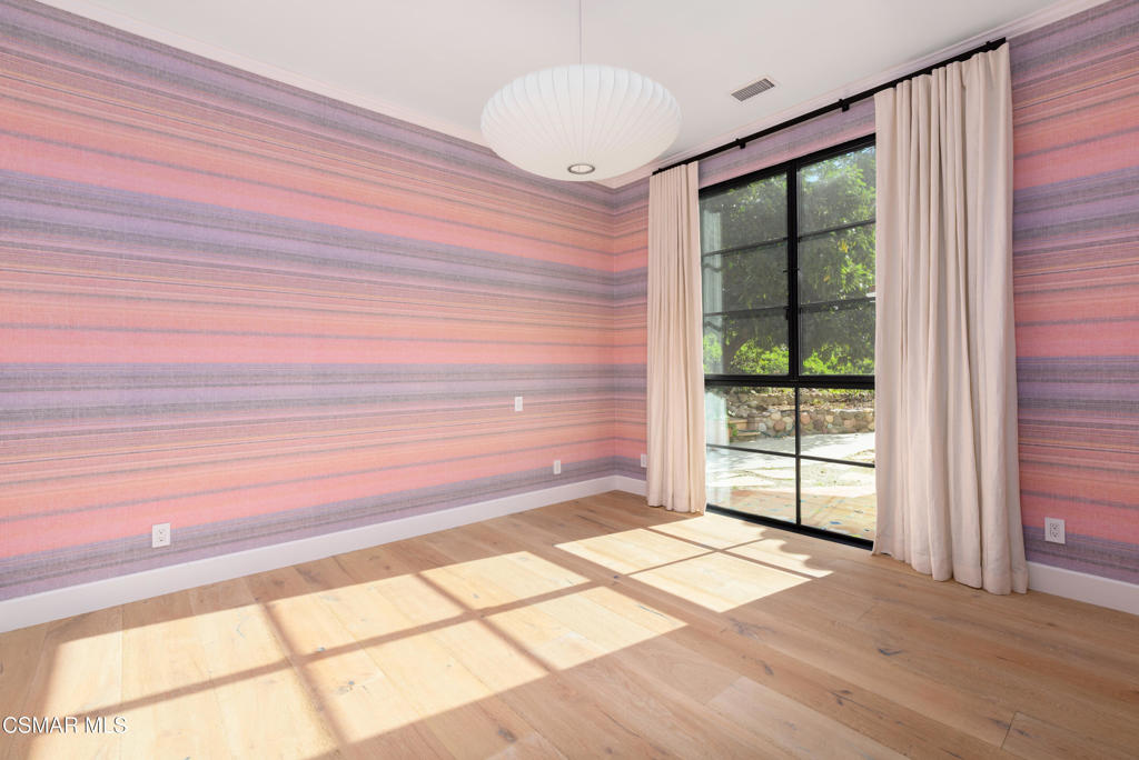 87 Pinecrest Road Westlake Village, CA 91361 - Photo 60 of 76 a view of empty room with window and wooden floor