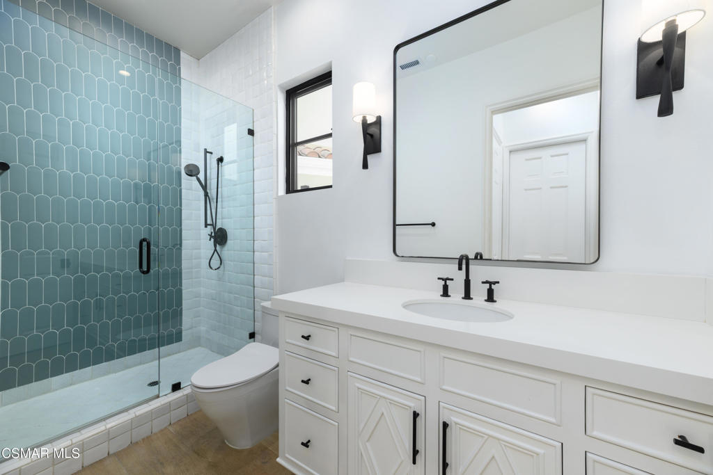 87 Pinecrest Road Westlake Village, CA 91361 - Photo 62 of 76 a bathroom with a sink toilet and shower