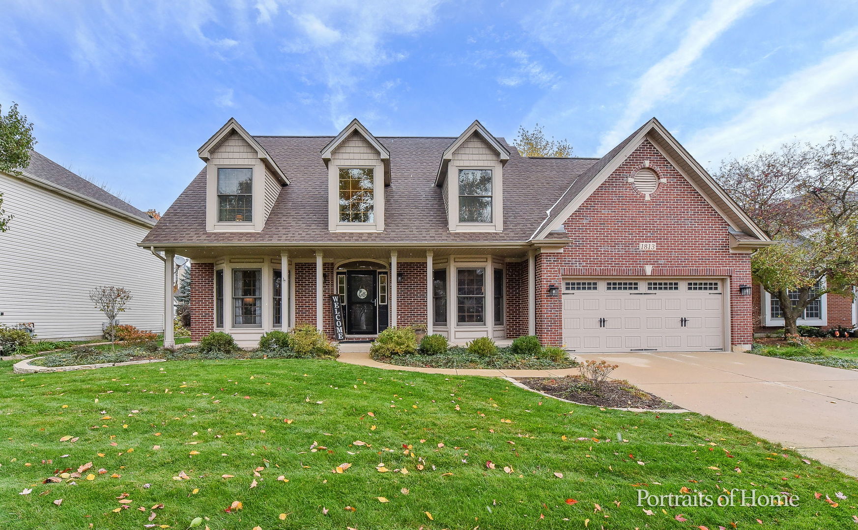 1813 Marne Road Bolingbrook, IL 60490 - Photo 1 of 30 a front view of a house with garden