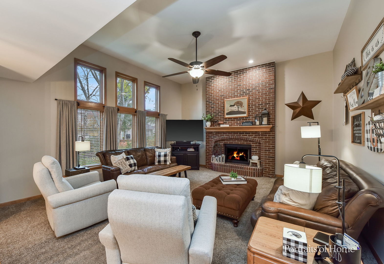 1813 Marne Road Bolingbrook, IL 60490 - Photo 12 of 30 a living room with furniture a large window and a fireplace
