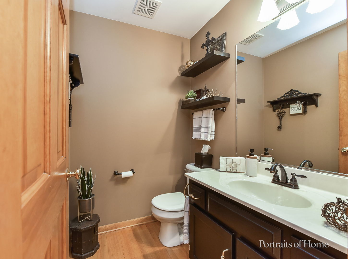 1813 Marne Road Bolingbrook, IL 60490 - Photo 14 of 30 a bathroom with a granite countertop sink a toilet and a mirror