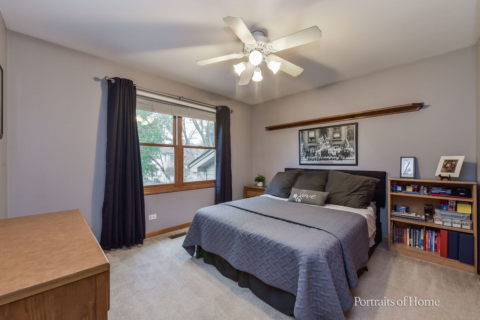1813 Marne Road Bolingbrook, IL 60490 - Photo 19 of 30 a bedroom with a large bed and a chandelier