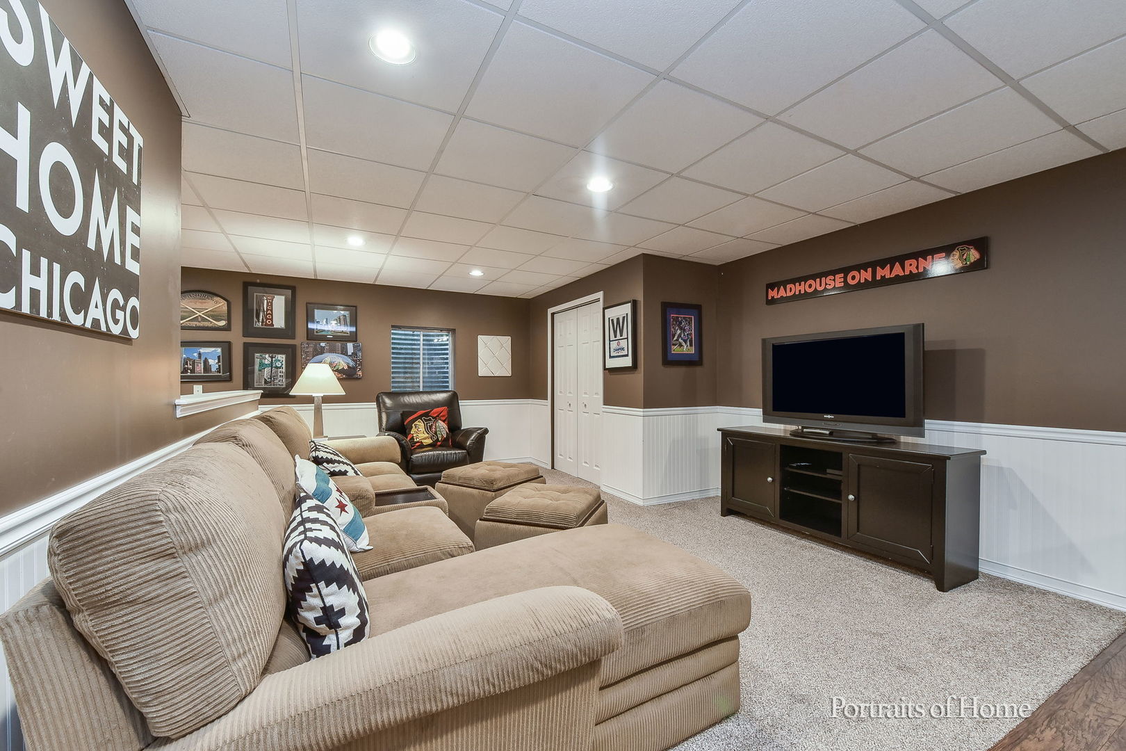 1813 Marne Road Bolingbrook, IL 60490 - Photo 25 of 30 a living room with furniture and a flat screen tv