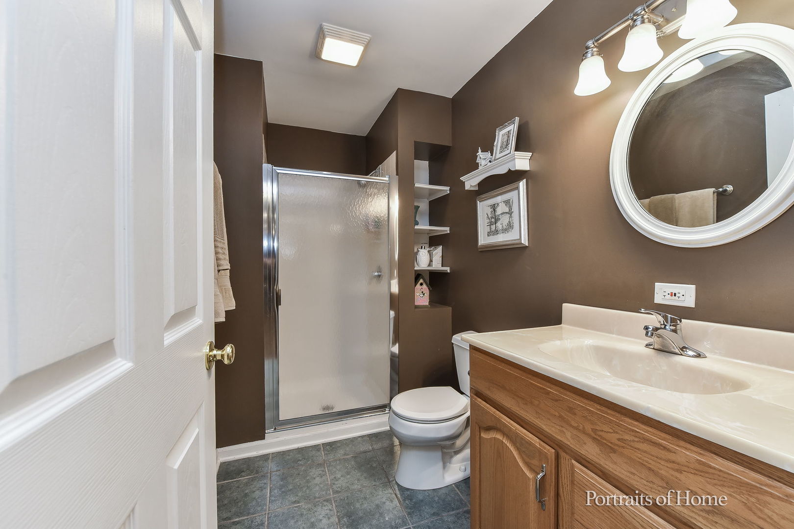 1813 Marne Road Bolingbrook, IL 60490 - Photo 27 of 30 a bathroom with a toilet sink and mirror