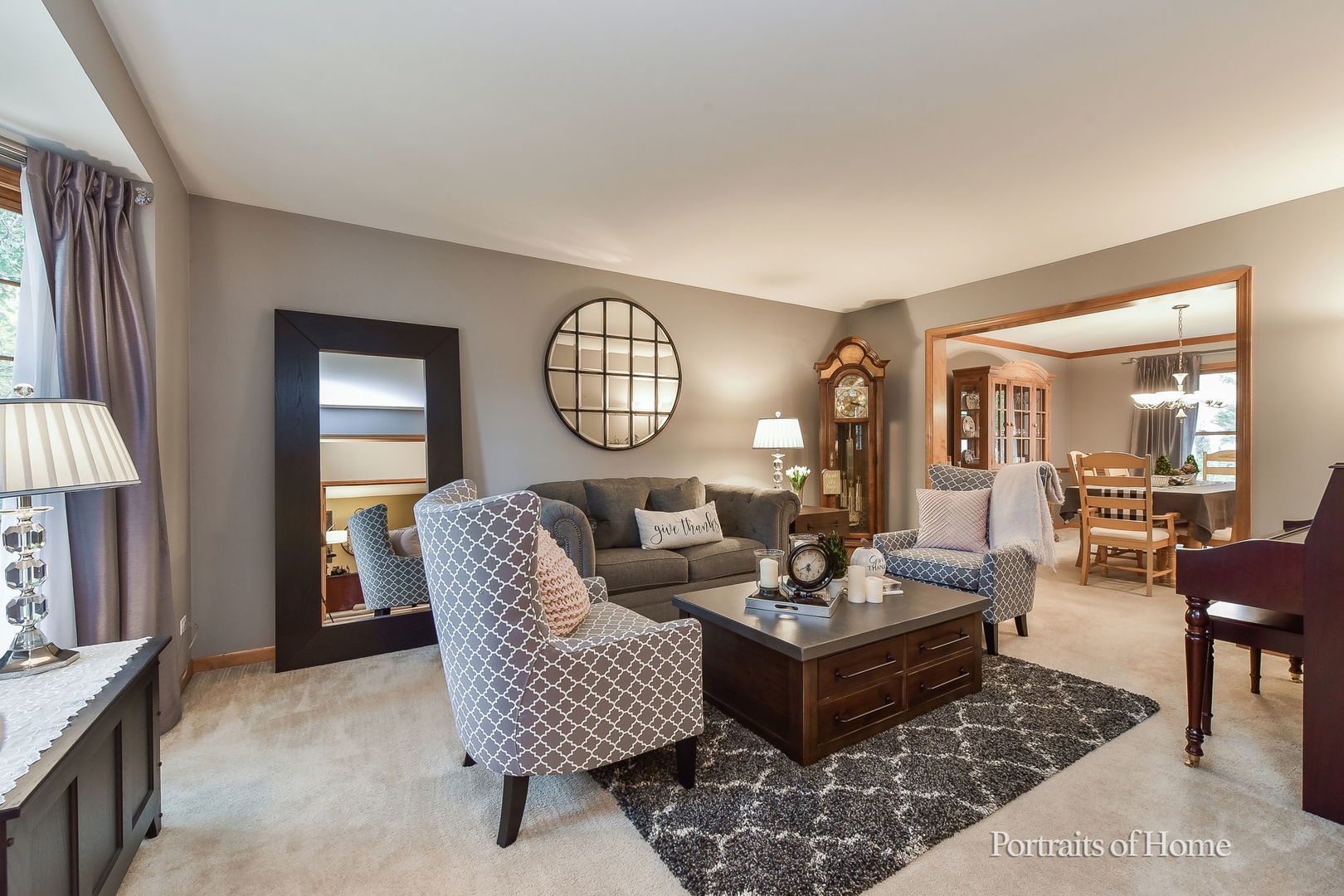 1813 Marne Road Bolingbrook, IL 60490 - Photo 5 of 30 a living room with furniture a rug and a large window