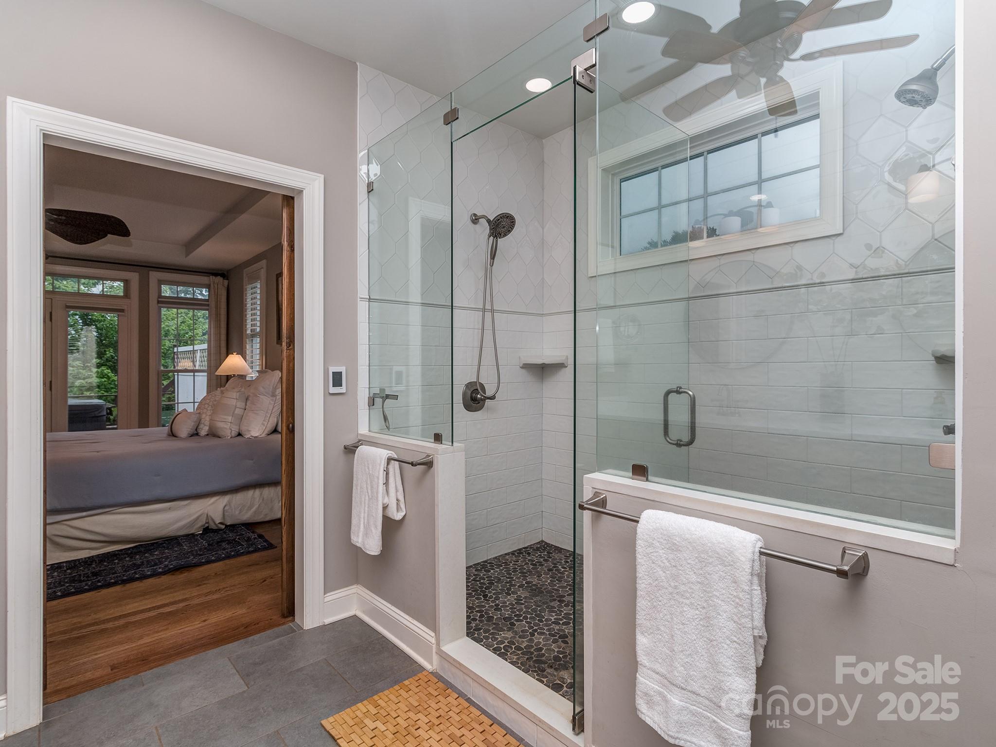 5951 Johnson Road Clover, SC 29710 - Photo 27 of 48 a bathroom with a glass door shower and a sink