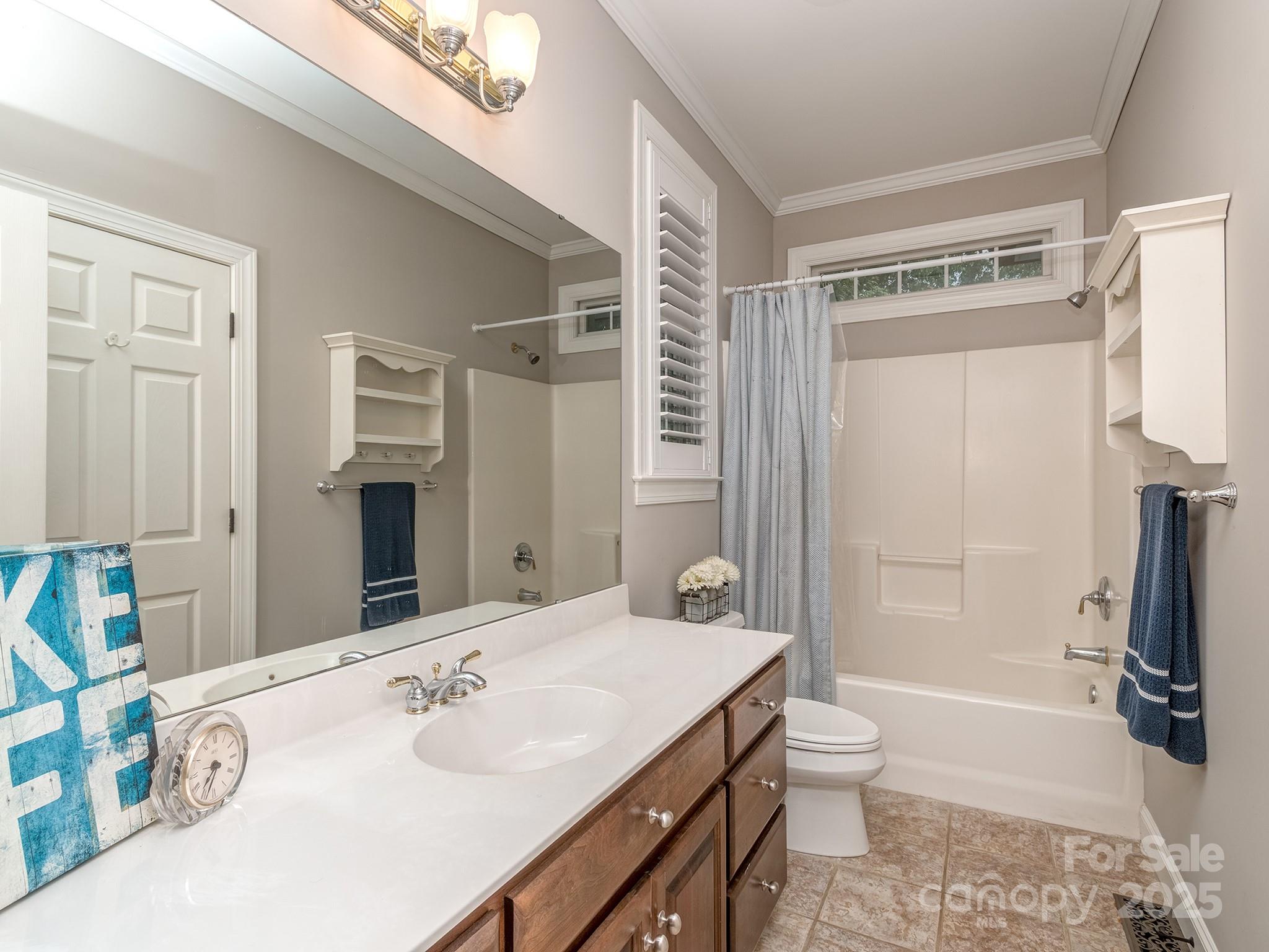 5951 Johnson Road Clover, SC 29710 - Photo 32 of 48 a bathroom with a sink a toilet and shower