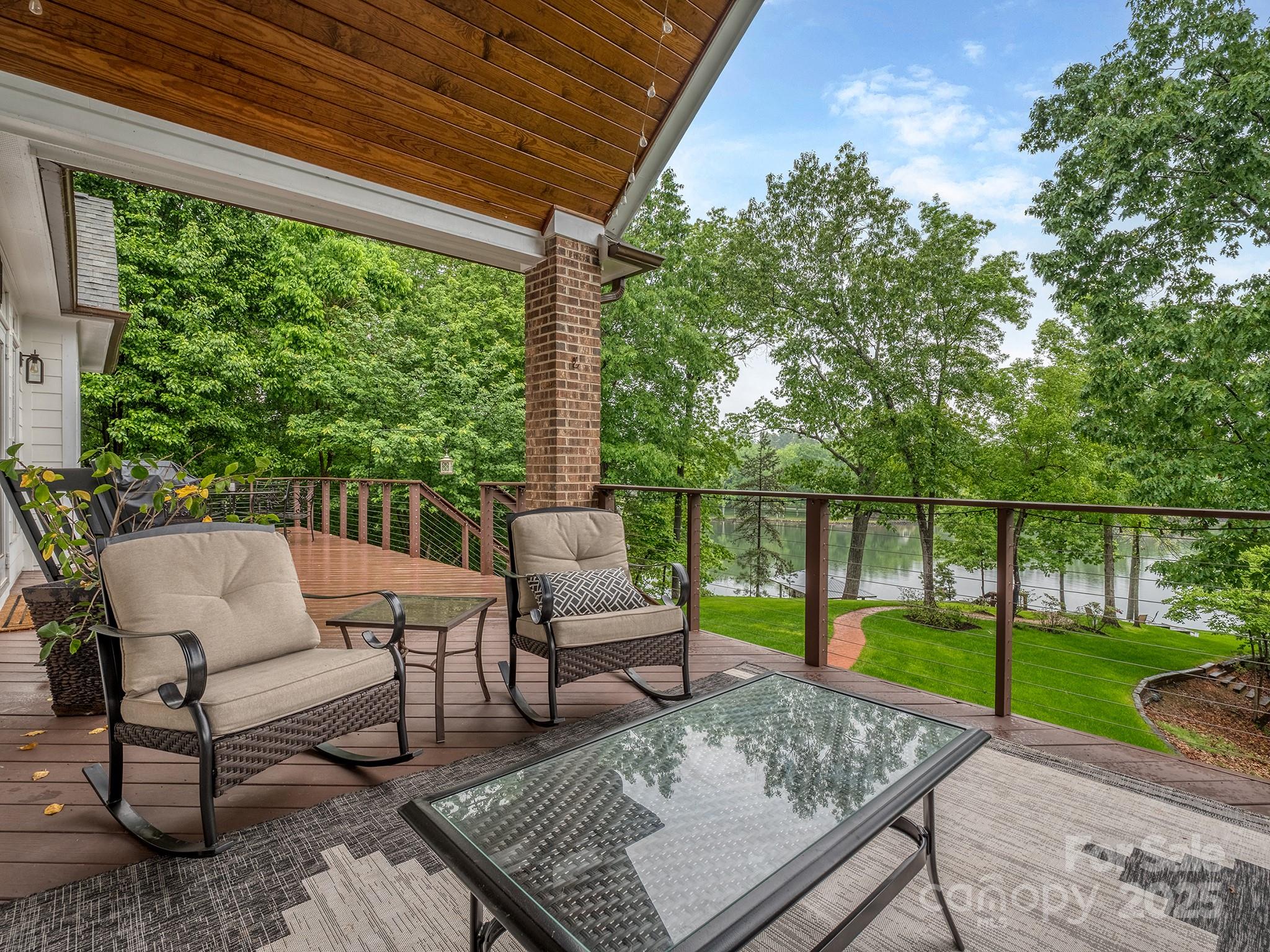 5951 Johnson Road Clover, SC 29710 - Photo 40 of 48 a view of a patio with couches chairs and wooden floor