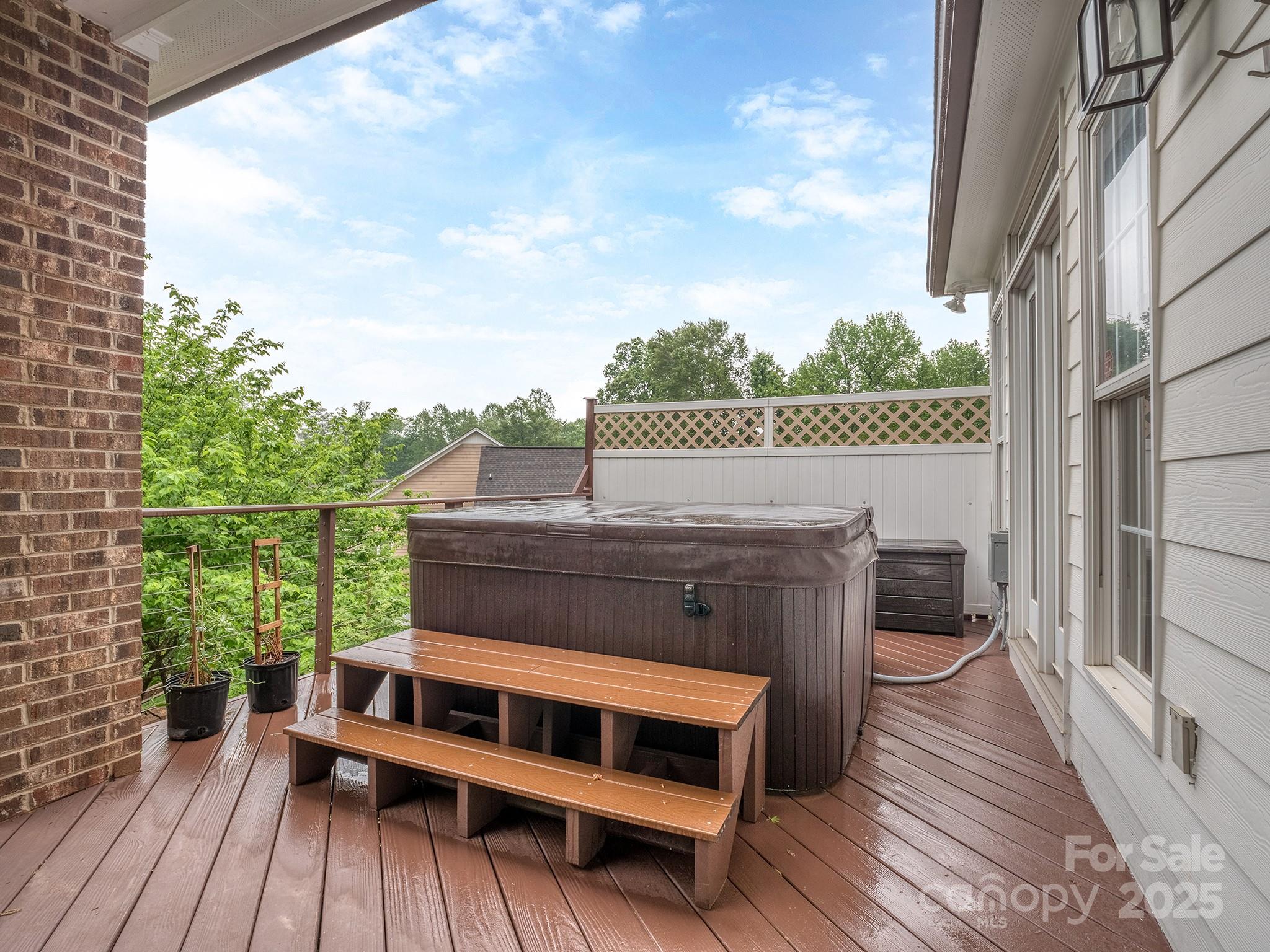 5951 Johnson Road Clover, SC 29710 - Photo 41 of 48 a view of roof deck with wooden floor and fence