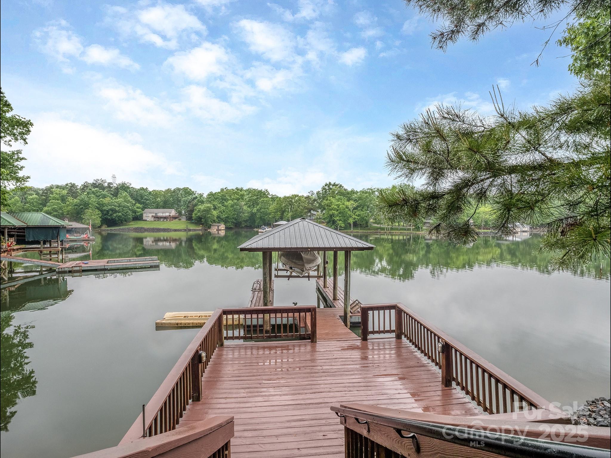5951 Johnson Road Clover, SC 29710 - Photo 42 of 48 a view of deck with seating and lake view
