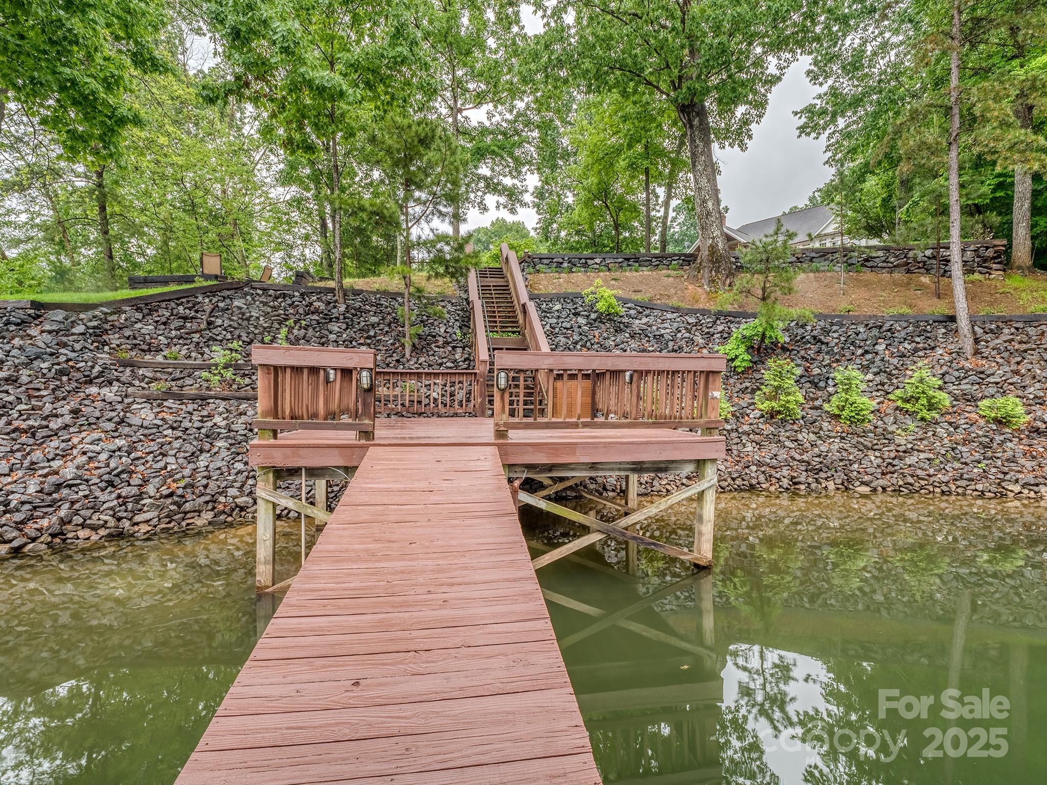 5951 Johnson Road Clover, SC 29710 - Photo 44 of 48 a view of a wooden deck with a lake view