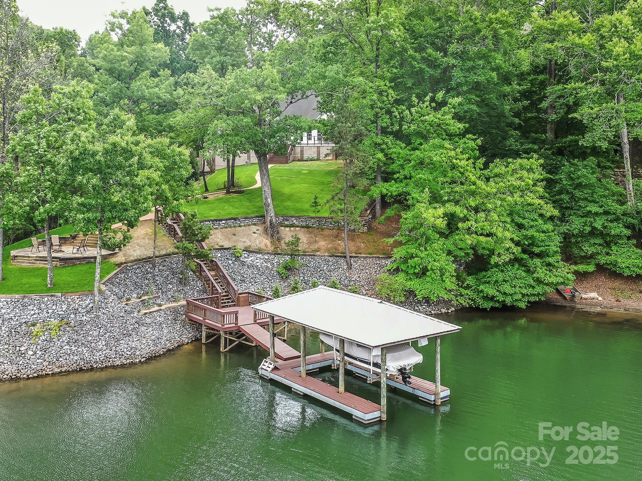 5951 Johnson Road Clover, SC 29710 - Photo 7 of 48 an aerial view of a house with a yard lake and outdoor seating