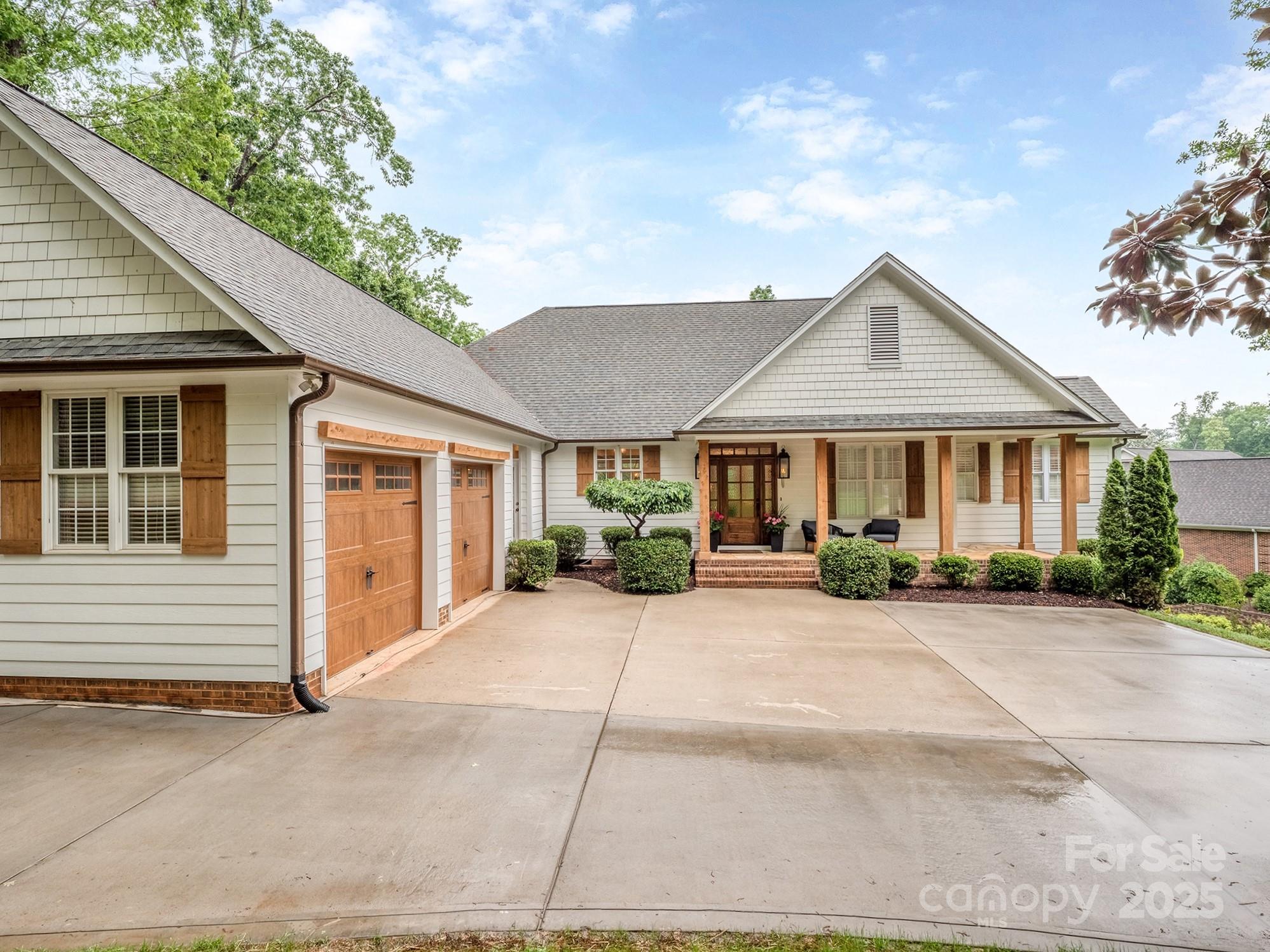 5951 Johnson Road Clover, SC 29710 - Photo 10 of 48 a front view of a house with yard and a garage