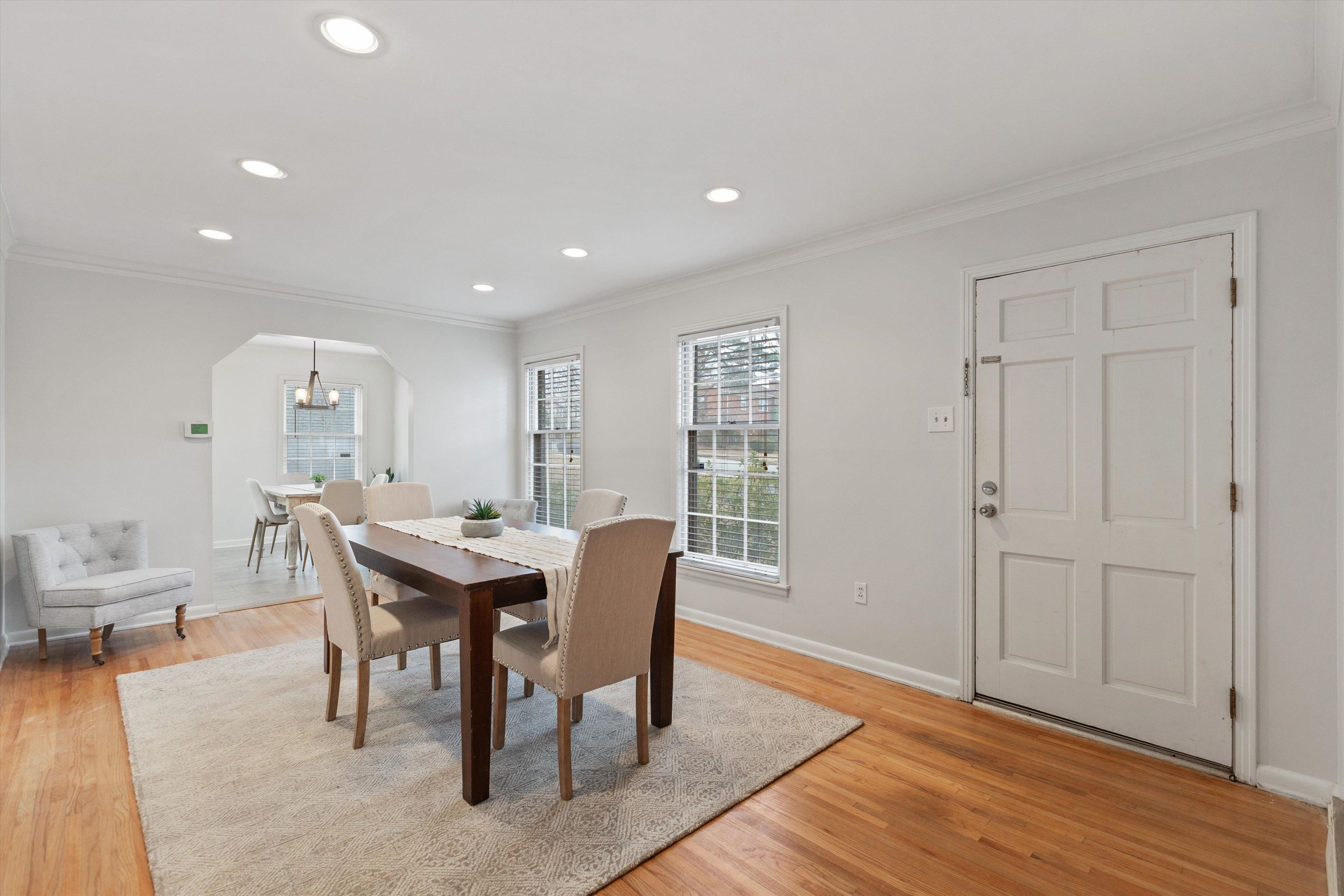 5555 Barfield Road Memphis, TN 38120 - Photo 13 of 23 a view of a dining room with furniture window and wooden floor