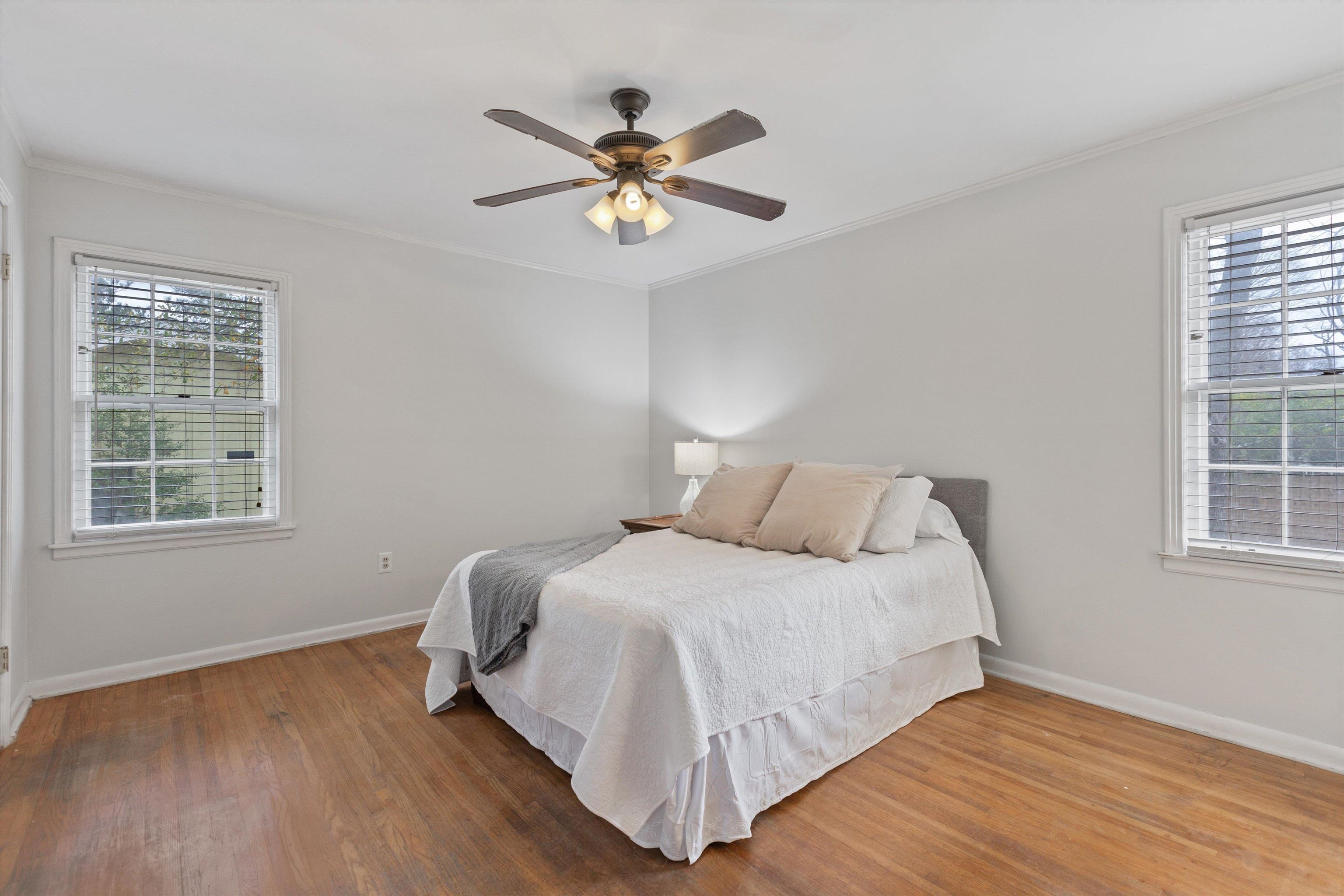 5555 Barfield Road Memphis, TN 38120 - Photo 15 of 23 a bedroom with a bed and window