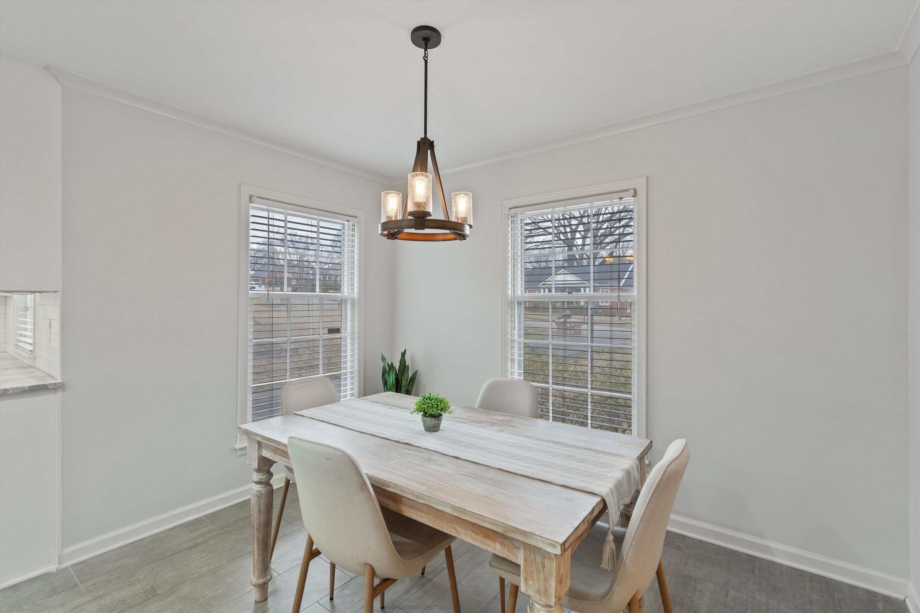 5555 Barfield Road Memphis, TN 38120 - Photo 6 of 23 a view of a dining room with furniture window and outside view