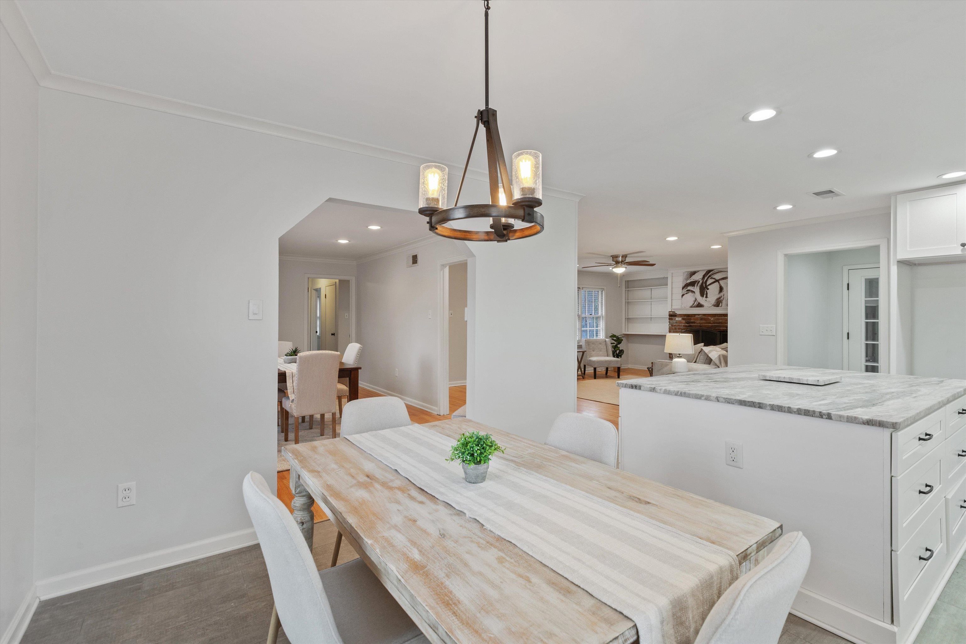5555 Barfield Road Memphis, TN 38120 - Photo 7 of 23 a kitchen with stainless steel appliances kitchen island a chandelier
