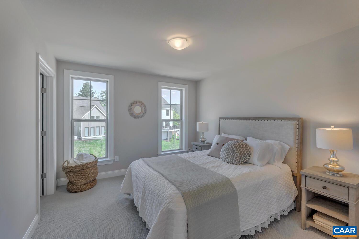 2 B Agatha Ridge Lane, Unit LOT 2 Crozet, VA 22932 - Photo 25 of 37 a bedroom with a bed and large windows