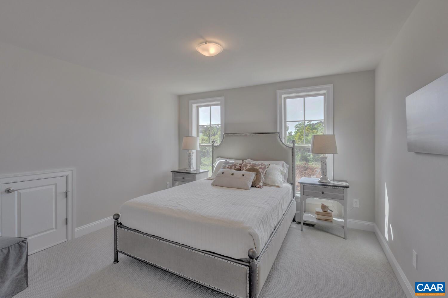 2 B Agatha Ridge Lane, Unit LOT 2 Crozet, VA 22932 - Photo 29 of 37 a bedroom with a bed and a night stand