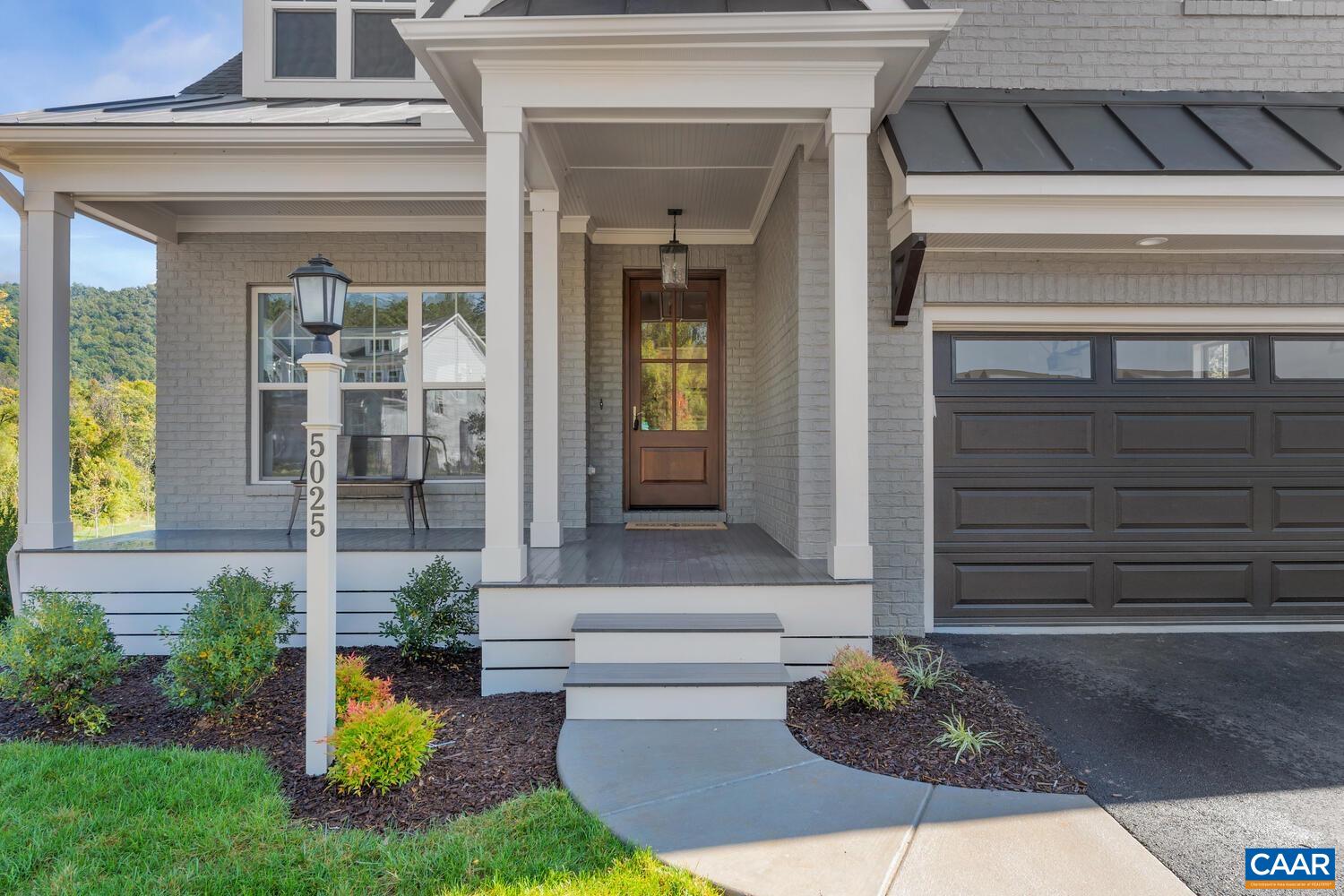 2 B Agatha Ridge Lane, Unit LOT 2 Crozet, VA 22932 - Photo 3 of 37 a front view of a house with a garden