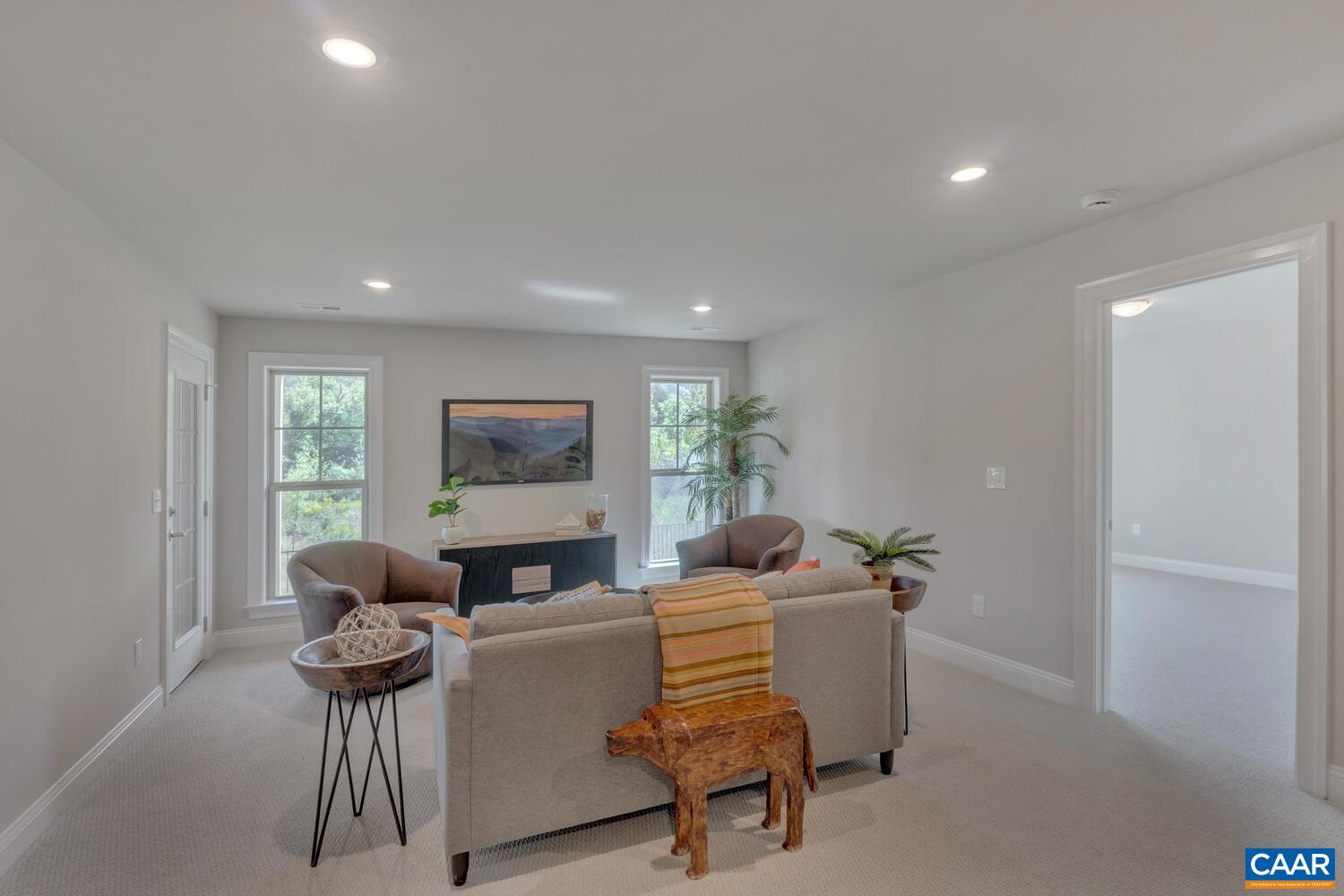 2 B Agatha Ridge Lane, Unit LOT 2 Crozet, VA 22932 - Photo 31 of 37 a living room with furniture and a window