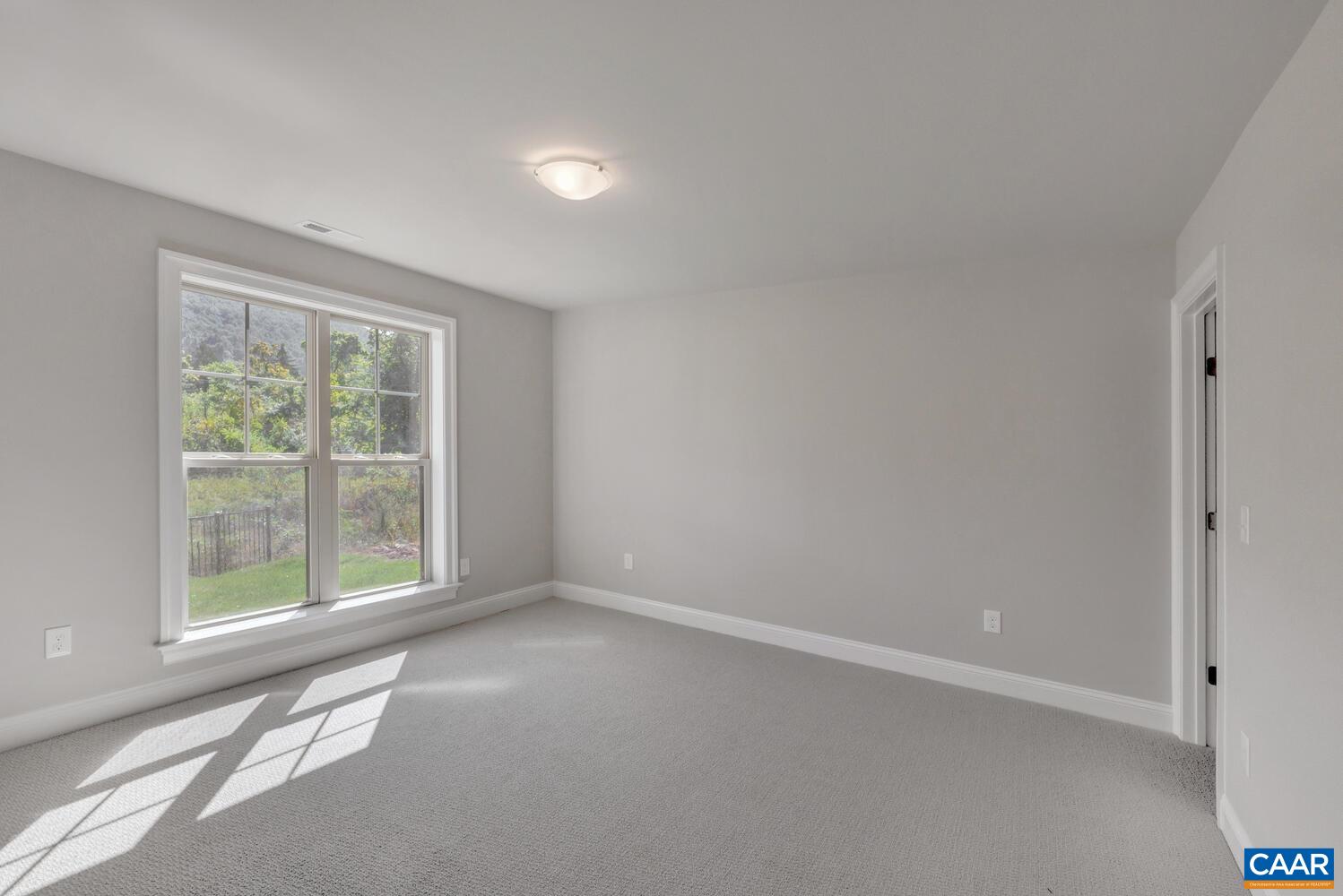 2 B Agatha Ridge Lane, Unit LOT 2 Crozet, VA 22932 - Photo 32 of 37 an empty room with a window