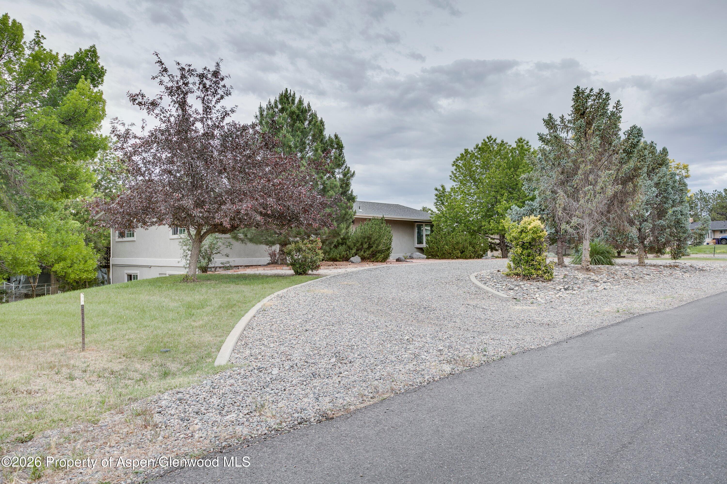 2218 Saddlehorn Road Grand Junction, CO 81507 - Photo 4 of 47 3-2218_Saddlehorn_Rd_Front-5