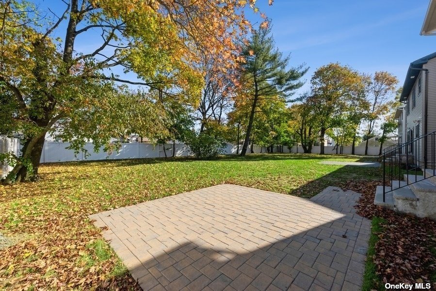 608 Meadowbrook Road North Merrick, NY 11566 - Photo 36 of 36 a view of a garden with an ocean