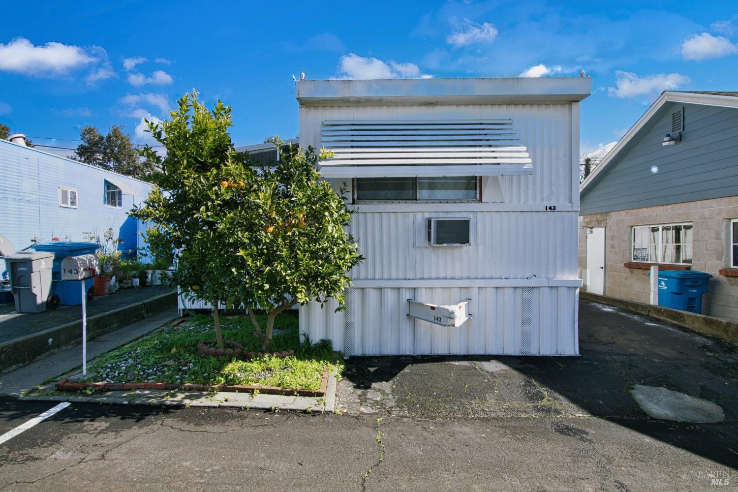 a house view with a garden space