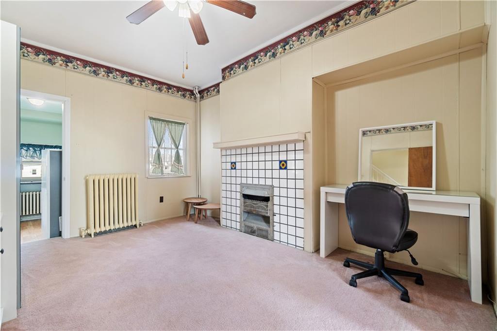 3407 Ward Street Pittsburgh, PA 15213 - Photo 17 of 39 a view of a livingroom with workspace and a window