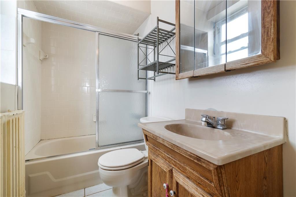 3407 Ward Street Pittsburgh, PA 15213 - Photo 25 of 39 a bathroom with a sink toilet and shower