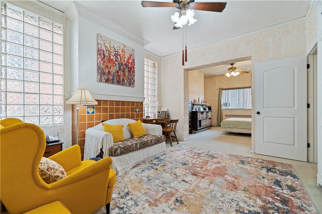 3407 Ward Street Pittsburgh, PA 15213 - Photo 6 of 39 a bedroom with furniture and a chandelier