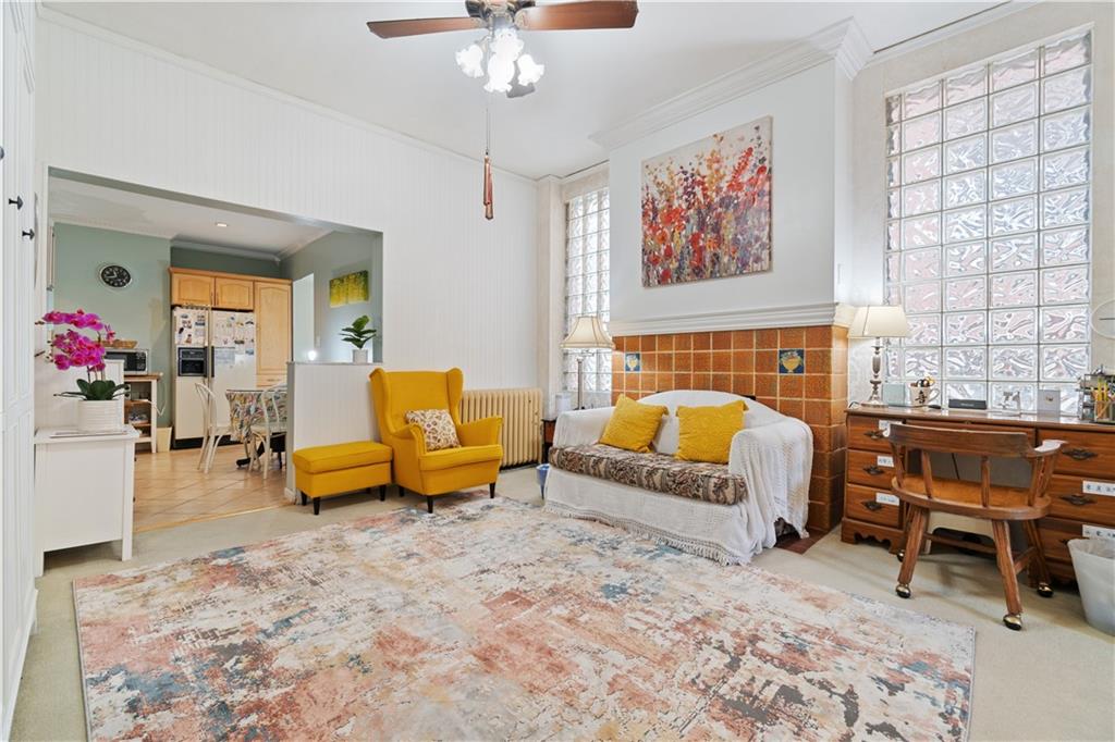 3407 Ward Street Pittsburgh, PA 15213 - Photo 7 of 39 a bedroom with furniture and a chandelier