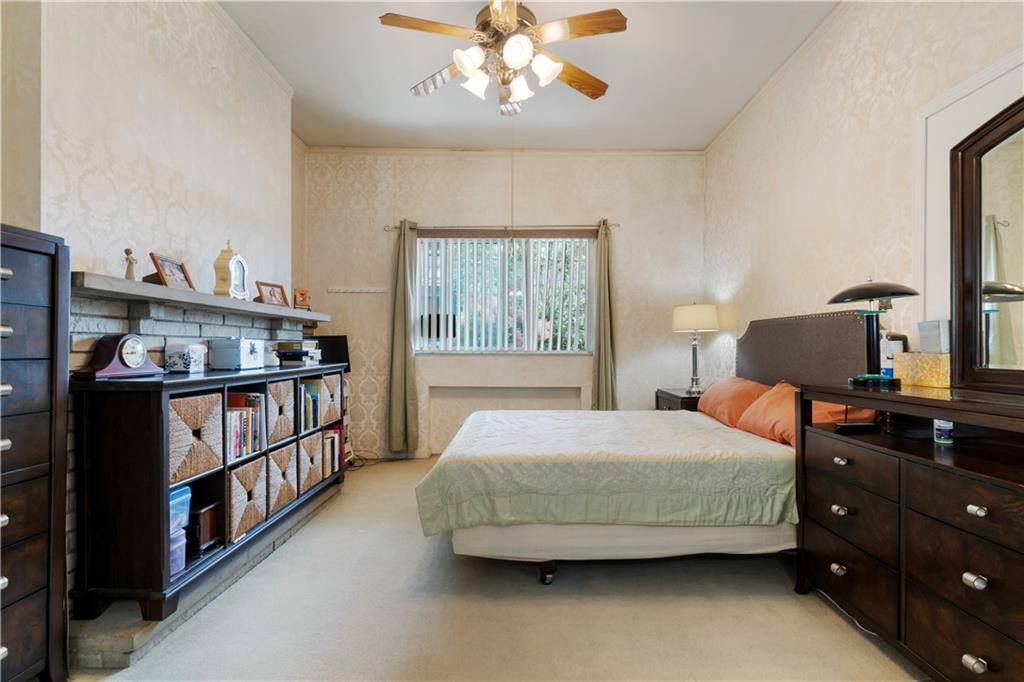 3407 Ward Street Pittsburgh, PA 15213 - Photo 8 of 39 a bedroom with a bed and a window