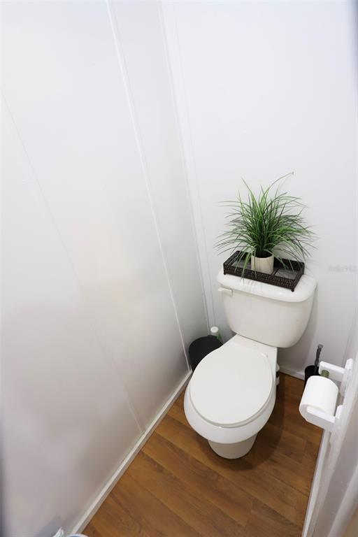 41 Ferguson Lane Frostproof, FL 33843 - Photo 23 of 33 a white toilet sitting next to a white wall