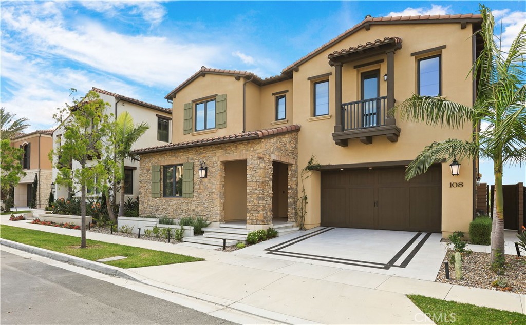 108 Salt Spring Irvine, CA 92602 - Photo 2 of 75 a front view of a house with a yard
