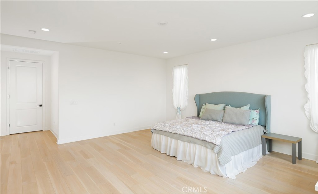 108 Salt Spring Irvine, CA 92602 - Photo 33 of 75 a bedroom with a bed and a night stand