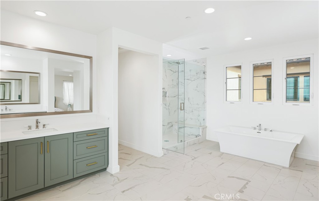 108 Salt Spring Irvine, CA 92602 - Photo 35 of 75 a spacious bathroom with a double vanity sink mirror and double