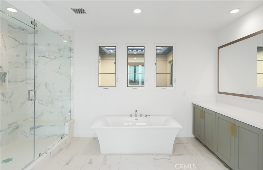 108 Salt Spring Irvine, CA 92602 - Photo 38 of 75 a white bath tub sitting next to a white sink