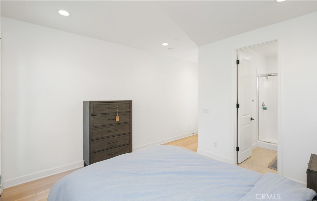 108 Salt Spring Irvine, CA 92602 - Photo 46 of 75 a bedroom with a bed and a dresser